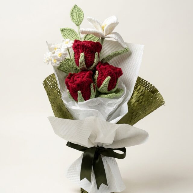 Handmade deep red crochet rose and white lily bouquet, front view