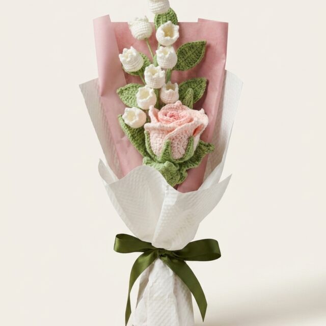 Handmade pink crochet tulip and lily bouquet, front view